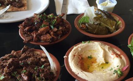 Mezze platter with hummus, falafel and dips at Aladdin Mediterranean Cafe San Diego